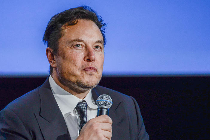 Owner Elon Musk has told remaining Twitter employees that they must decide whether to stay or go by Thursday afternoon. Here, Musk, as CEO of Tesla, speaks at a conference in Norway.