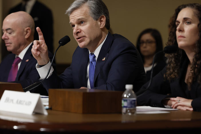 Federal Bureau of Investigation Director Christopher Wray testifies before the House Homeland Security Committee on Tuesday. Homeland Security Secretary Alejandro Mayorkas and National Counterterrorism Center Director Christine Abizaid were also there to discuss threats to the U.S.