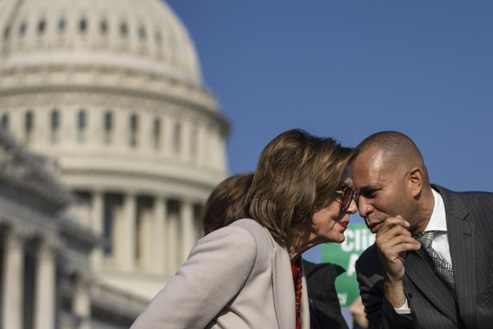 Speaker of the House Nancy Pelosi, D-Calif., speaks with Rep. Hakeem Jeffries, D-N.Y., during a news conference with House Democrats about the Build Back Better legislation, outside of the Capitol in 2021.