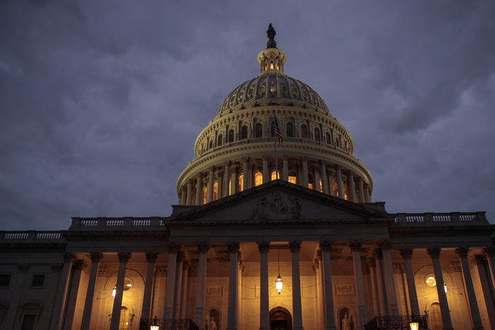 The U.S. Capitol is seen at dusk, January 21, 2018 in Washington, DC.