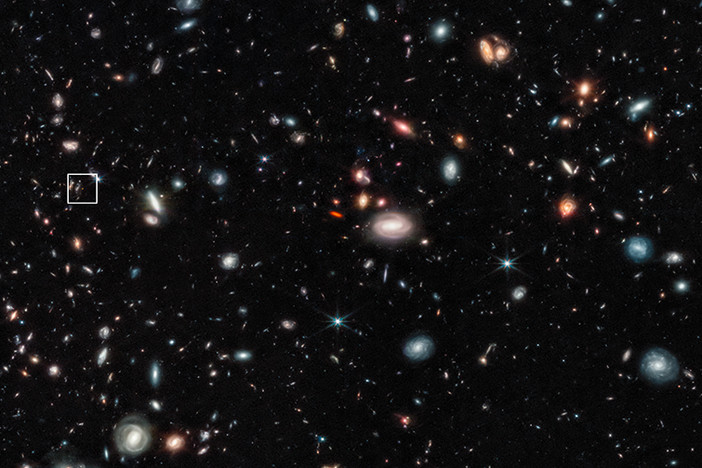 The small red dot highlighted inside the white box on this James Webb Space Telescope image is an early galaxy, seen as it looked just 350 million years after the Big Bang.