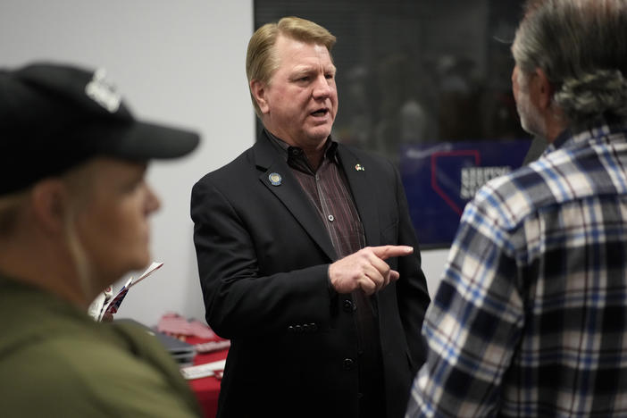 Jim Marchant, center, GOP nominee for secretary of state in Nevada, lost his election and also underperformed fellow Republicans running for U.S. senator and governor.
