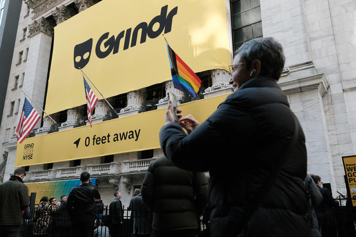 Grindr puts on a public show outside of the New York Stock Exchange (NYSE) as the company goes public following its merger with special purpose acquisition company (SPAC) Tiga Acquisition Corp. on November 18, 2022 in New York City.