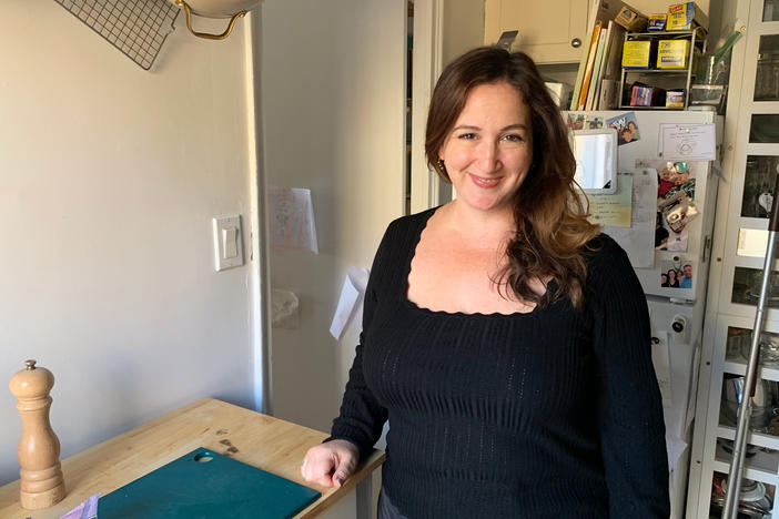 Deb Perelman in her small "smitten" kitchen in New York City's East Village. "I make it work!" she says. "I like that there's a lot of light coming in."