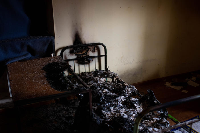 A burned cot in a police station in Kherson on Wednesday. Kherson residents say Russians used the police station to detain and torture violators of curfew and people suspected of collaborating with Ukrainian authorities.