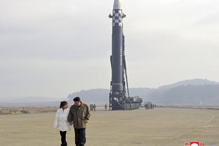 This photo provided on Nov. 19, 2022 by the North Korean government shows North Korean leader Kim Jong Un and his daughter inspect the site of a missile launch at Pyongyang International Airport in Pyongyang, North Korea, on Friday.