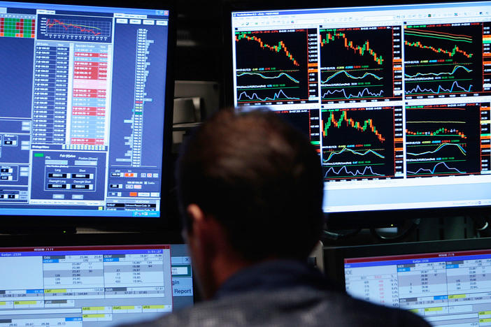 Computer monitors show financial data. More data being created and stored necessitates the use of new unit measurements.