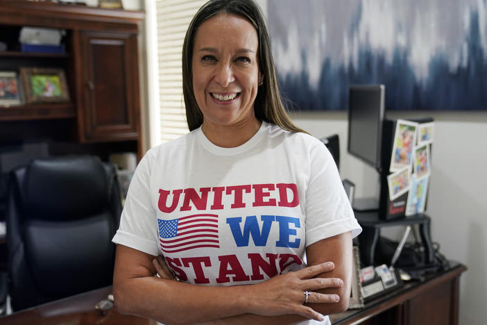 Republican Monica De La Cruz-Hernandez flipped the 15th House Congressional District in one of Texas' only remaining competitive districts. In this file photo, she talks in her office in Alamo, Texas, July 8, 2021.
