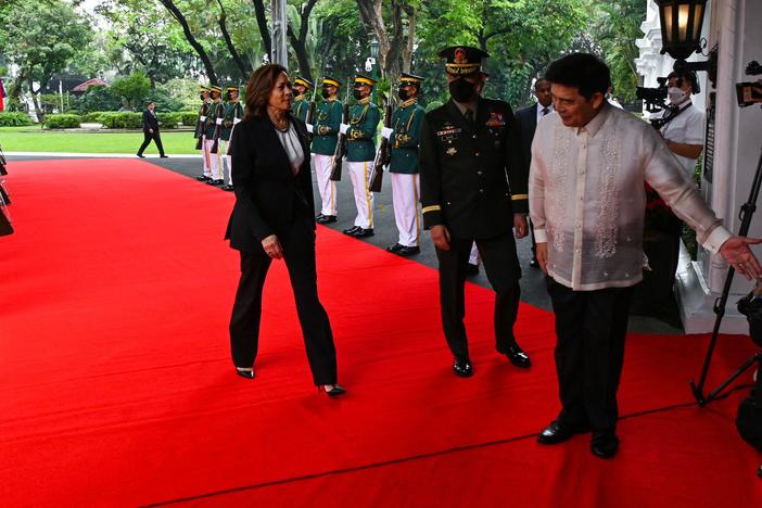 Philippines President Ferdinand Marcos Jr., right, welcomes Vice President Harris to Malacanang Palace in Manila on Nov. 21, 2022.