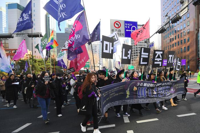 South Korean women take part in a march supporting feminism during a protest to mark International Women's Day in Seoul on March 8, 2019. Anti-feminism has been on the rise, turbocharged this year by President Yoon Suk Yeol.