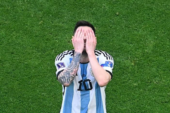 Argentina's forward Lionel Messi reacts during his team's opening round 2-1 loss to Saudi Arabia at the 2022 World Cup in Qatar.