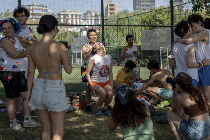 Participants hang out on the second day of Queer Olympix V in Kalamiş Park, Istanbul, on Aug. 28, 2021. The first Queer Olympix following a 2019 police ban and a 2020 hiatus due to the COVID-19 pandemic, the 2021 event was held in secrecy. This year, the Olympix were once again held at Kalamis, again in secret, with two lawyers present in case the police came.
