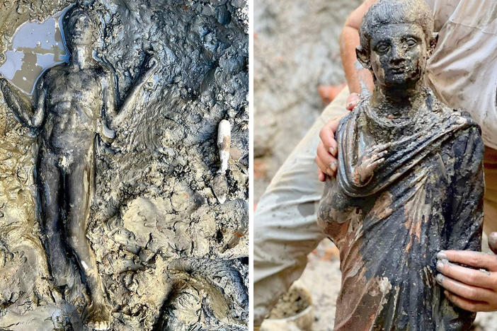 Statues at the site of the discovery of two dozen well-preserved bronze statues from an ancient Tuscan thermal spring in San Casciano dei Bagni, Italy on Nov. 3.