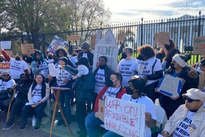Tenant activists from around the country rally outside the White House on Nov. 16 in Washington, D.C. They want the Biden administration to regulate rent increases on federally backed housing.