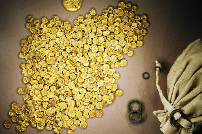 Coins of the Celtic Treasure are on display at the local Celtic and Roman Museum in Manching, Germany, May 31, 2006. A senior official said Wednesday that organized crime groups were likely behind the theft of the ancient gold coins stolen from a museum in southern Germany this week.