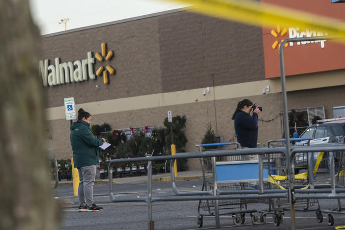 Members of the FBI investigate Tuesdays fatal shooting at the Chesapeake Walmart Supercenter on Wednesday in Chesapeake, Virginia. Six people, including the suspected gunman, are dead following.