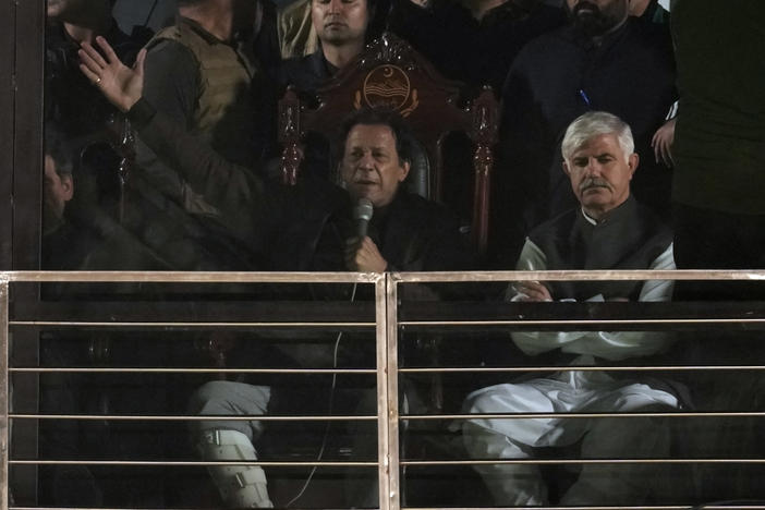 Pakistan's former prime minister and opposition leader, Imran Khan, addresses to his supporters during a rally, in Rawalpindi, Pakistan, on Saturday. Khan said Saturday his party was quitting the country's regional and national assemblies.