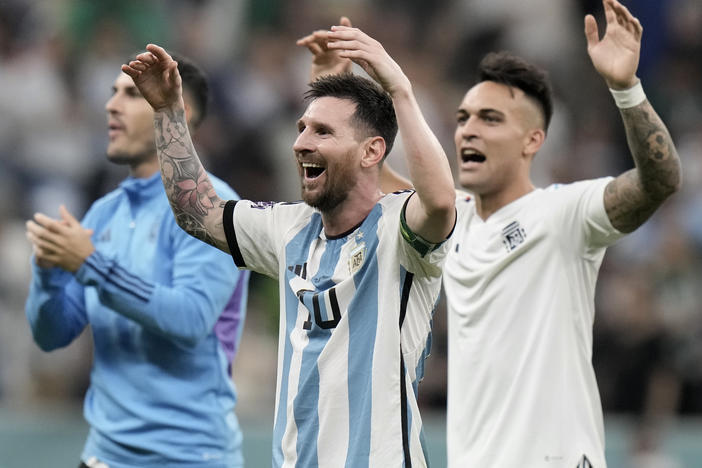 Argentina's Lionel Messi, center, celebrates at the end of the World Cup group C soccer match between Argentina and Mexico, at the Lusail Stadium in Lusail, Qatar, on Saturday. Argentina won 2-0.