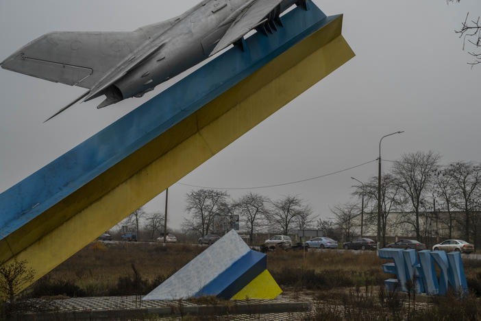 Cars leave Kherson, southern Ukraine, Saturday, Nov. 26, 2022. Fleeing shelling, hundreds of civilians on Saturday streamed out of the southern Ukrainian city whose recapture they had celebrated just weeks earlier.