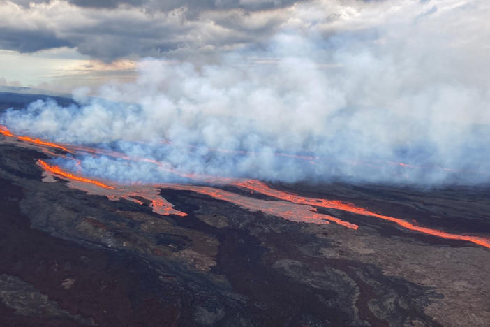 In this aerial photo released Monday by the U.S. Geological Survey, the Mauna Loa volcano is seen erupting from vents on the Northeast Rift Zone on the Big Island of Hawaii.