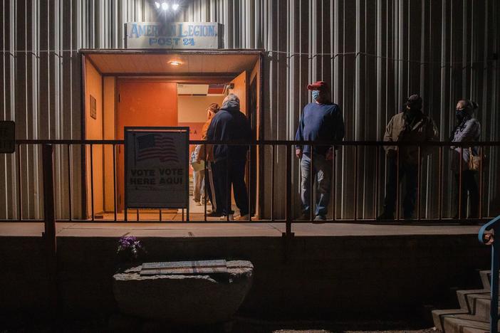 People wait in line to vote on Election Day 2020 in Tombstone, Ariz., in Cochise County. The county's Republican-led leadership has voted to delay certifying its 2022 election results, despite a state deadline on Monday.