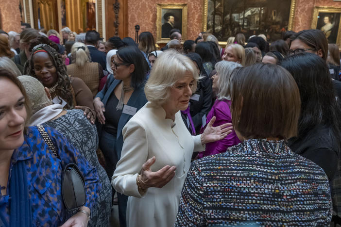 Charity leader Ngozi Fulani (center left) attends a reception held by Britain's Camilla, the queen consort, (center) to raise awareness of violence against women and girls in Buckingham Palace in London on Tuesday.