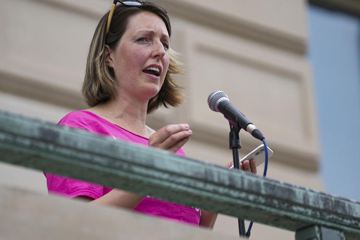 Dr. Caitlin Bernard, a reproductive health care provider, speaks during an abortion rights rally on June 25, 2022, at the Indiana Statehouse in Indianapolis.