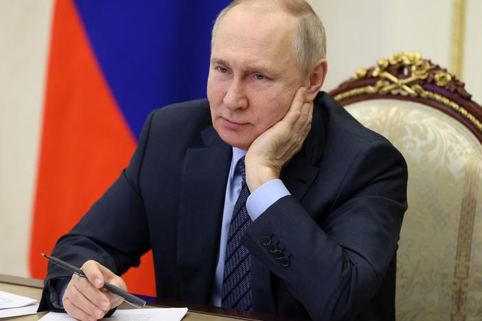 Russian President Vladimir Putin attends an event via video on Wednesday. The Kremlin is downplaying the prospect of Ukraine peace talks after President Biden said he would speak to Putin if "he's looking for a way to end the war."