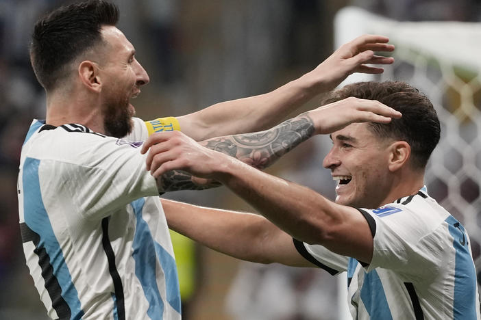 Argentina's Lionel Messi, left, and Julián Álvarez celebrate their side's second goal during the match between Argentina and Australia on Saturday.