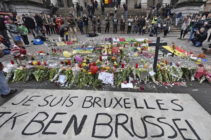 A banner for the victims of the bombings reads "I am Brussels" at the Place de la Bourse in the center of Brussels, March 23, 2016. The trial of 10 men accused over the 2016 suicide bombings at Brussels airport and an underground metro station starts in earnest this week.