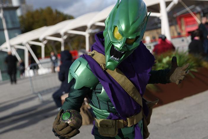 A cosplayer dressed as the Green Goblin poses for a photograph on arrival to attend the MCM Comic Con at the ExCeL exhibition center in London on Oct. 28.