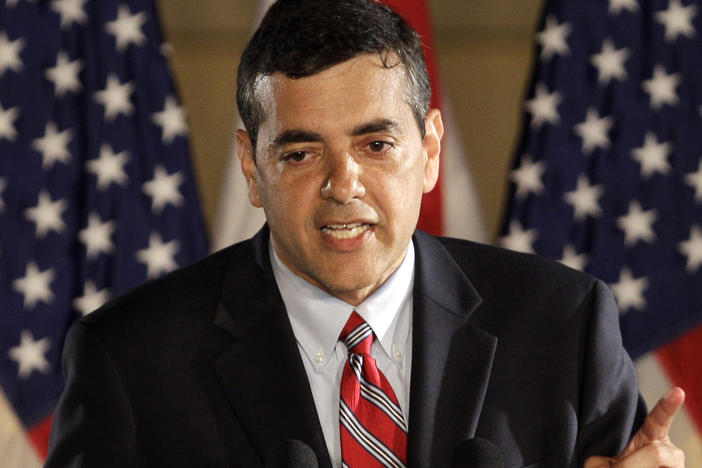 In this Nov. 2, 2010, file photo, then Florida Republican congressional candidate David Rivera speaks in Coral Gables, Fla. Federal authorities say Rivera broke the law in his dealings with Venezuela's state-run oil company.