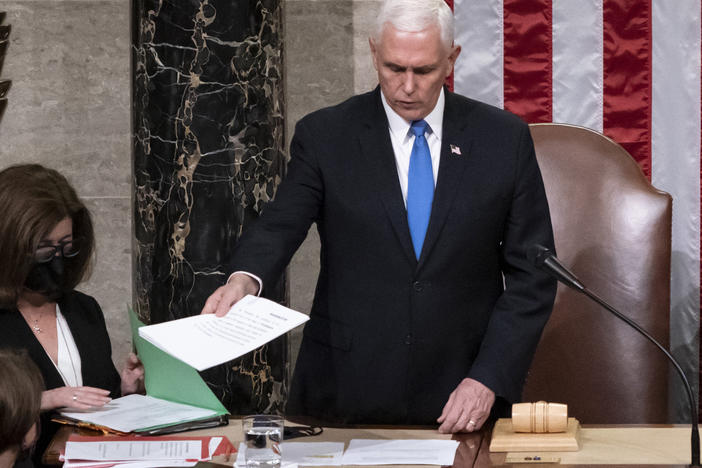 Legislation passed by Congress would clarify that the vice president's role in certifying the Electoral College vote is ceremonial. Here, then-Vice President Mike Pence is seen in the House chamber early on Jan. 7, 2021, to finish the work of the Electoral College after a mob loyal to President Donald Trump stormed the Capitol.