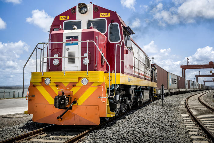 China's New Silk Road project is lending out billions to countries in Central Asia, the Middle East and Africa to build and upgrade railways, ports, pipelines, power grids and highways. Above: A Kenya Railways train pulls shipping containers as it departs from the Mombasa port station.