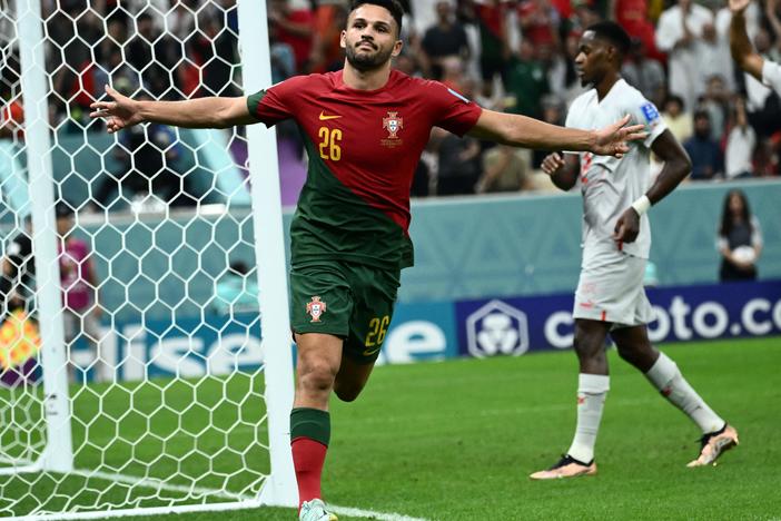 Portugal forward Gonçalo Ramos celebrates scoring his team's fifth goal, his hat-trick, during the Qatar 2022 World Cup round of 16 football match between Portugal and Switzerland on December 6, 2022.