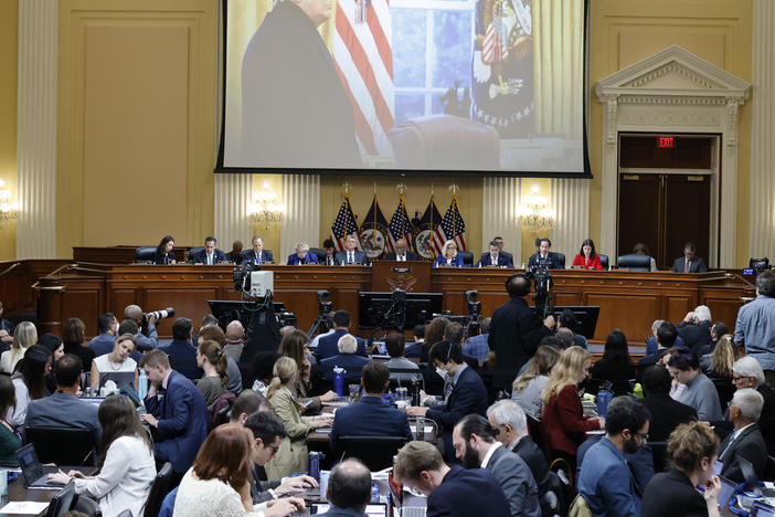 A photo of then-President Donald Trump speaking is displayed as the House select committee investigating the Jan. 6 attack on the Capitol holds a hearing on on Oct. 13.