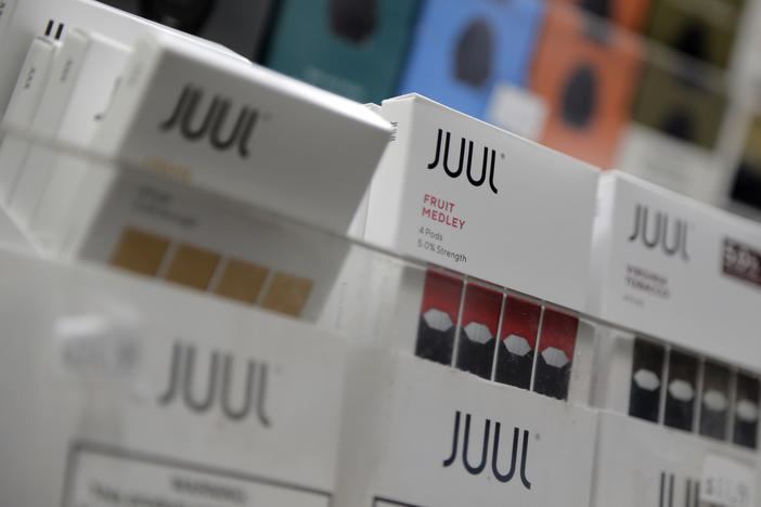 Juul products are displayed at a smoke shop in New York on Dec. 20, 2018.