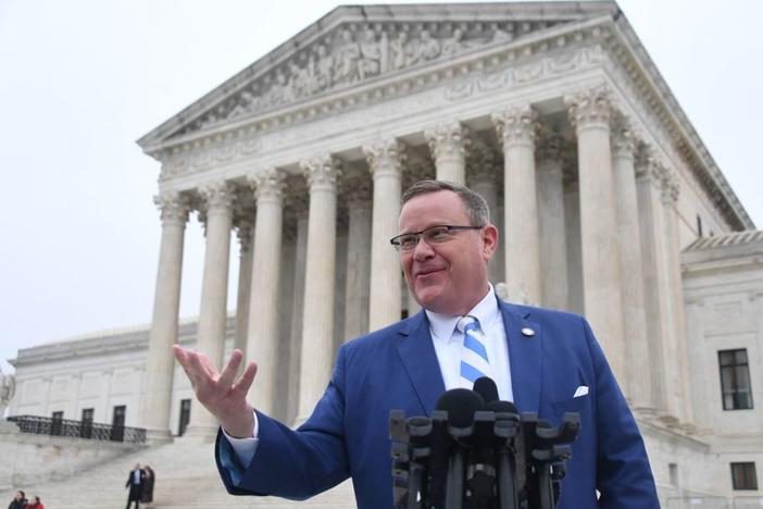 North Carolina House Speaker Tim Moore, a Republican, speaks Wednesday to reporters in front of the U.S. Supreme Court. State Republicans want the court to overturn a decision by the state Supreme Court that ruled that the Republican legislature, in drawing new congressional district lines after the 2020 Census, had violated the state constitution with an extreme partisan gerrymander.