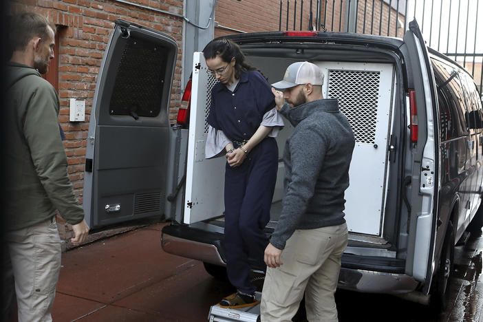 Donnae Barlow arrives at the federal courthouse in Flagstaff, Ariz., on Wednesday. Barlow and two other women from a polygamous sect near the Arizona-Utah border are charged with kidnapping and impeding a foreseeable prosecution.