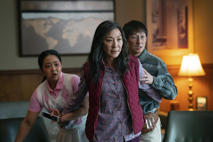 This image released by A24 Films shows, from left, Stephanie Hsu, Michelle Yeoh and Ke Huy Quan in a scene from <em>Everything Everywhere All At Once</em>.