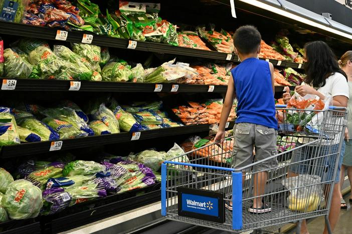 Consumers shop in the produce section of a Walmart store in Burbank, Calif., on August 15, 2022. Produce prices have been rising recently, the latest area hit by inflation.