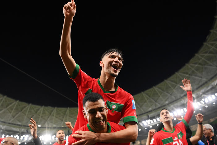 Achraf Dari and Walid Cheddira of Morocco celebrate after the 1-0 win during the quarterfinal match between Morocco and Portugal at Al Thumama Stadium on Saturday in Doha, Qatar.