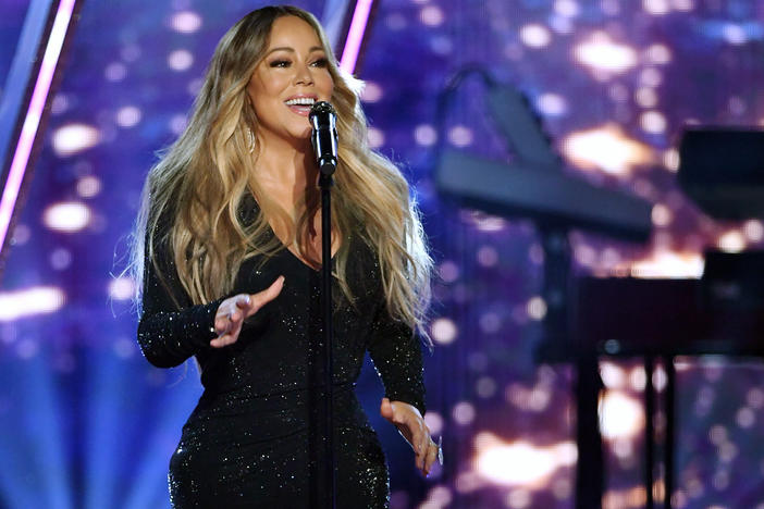 Mariah Carey, pictured performing at 2019 Billboard Music Awards, has topped the charts again with her signature Christmas hit.