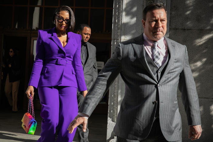 Megan Thee Stallion, whose legal name is Megan Pete, makes her way from the Hall of Justice to the courthouse to testify in the trial of Rapper Tory Lanez for allegedly shooting her on Tuesday, Dec. 13 in Los Angeles, CA.