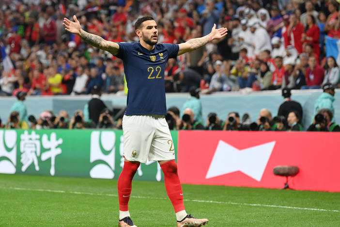 Theo Hernández of France celebrates after scoring the team's first goal during the 2022 World Cup semifinal between France and Morocco on December 14, 2022 in Al Khor, Qatar.