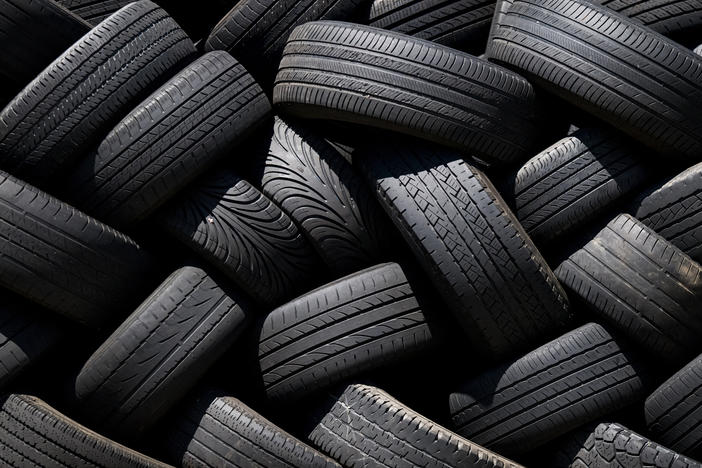 Used tires stacked at a Goodyear auto service location in South San Francisco, Calif., on July, 2020.