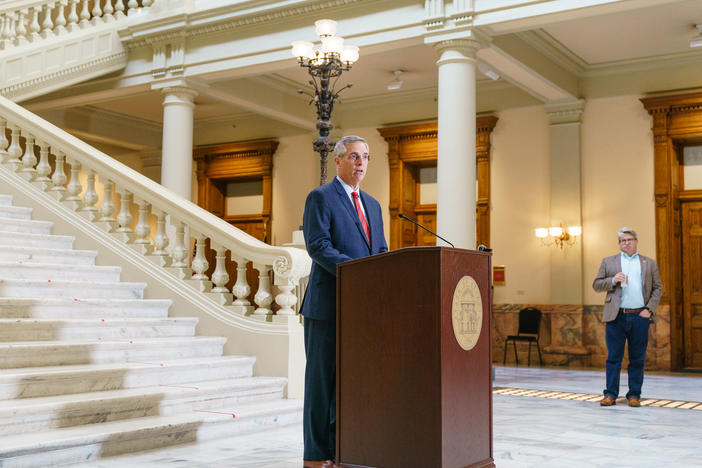 Georgia Secretary of State Brad Raffensperger, a Republican who's seen here on Oct. 25, is the ultimate decider of the state's presidential primary date. At right is Gabriel Sterling, chief operating officer in Raffensperger's office.