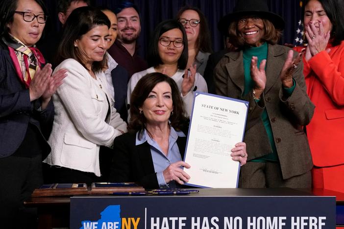 Attendees applaud after New York State Gov. Kathy Hochul announced actions to combat hate crimes at her office in New York City in November 2022. Hochul has formed a new unit to combat hate and bias across the state that will focus on education, early detection and mobilizing support in areas where a bias-related incidents have occurred.