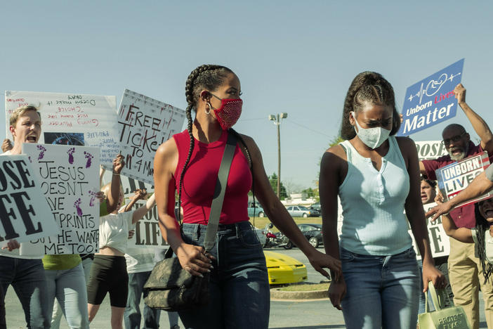 In an episode of<em> P-Valley</em> (Starz), Mercedes (Brandee Evans) and her daughter Terricka (A'zaria Carter) face protesters outside an abortion clinic.