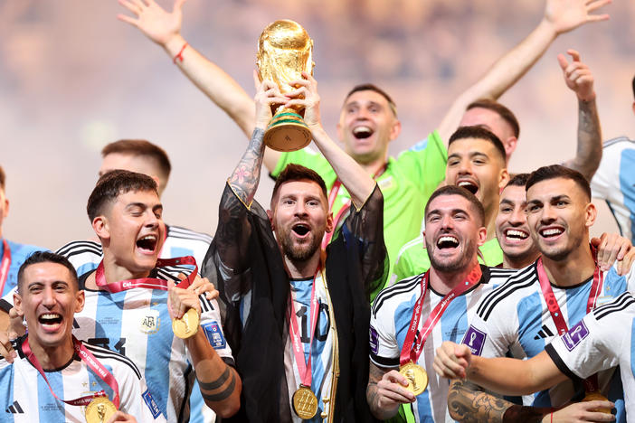 Lionel Messi of Argentina lifts the FIFA World Cup Qatar 2022 Winner's Trophy during the FIFA World Cup Qatar 2022 Final match between Argentina and France at Lusail Stadium on December 18, 2022 in Lusail City, Qatar.